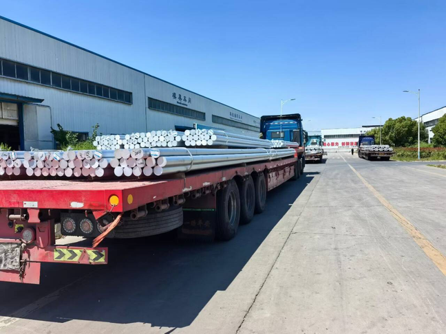Aluminum billets transported to the Consmos factory